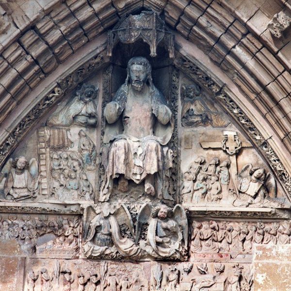 Lleida.- Seu Vella, S. XII a XV d’estil romànic i gòtic. Timpà de la porta dels Apòstols, S. XIV/XV amb la imatge del escena bíblica del Judici Final (3/1996)
