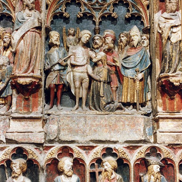 Lleida.- Església de Sant Llorenç, S. XII. Detalls del retaule de pedra policromada del S. XIV amb escenes de la vida de Sant Llorenç de Bartomeu de Robió (5/2000)