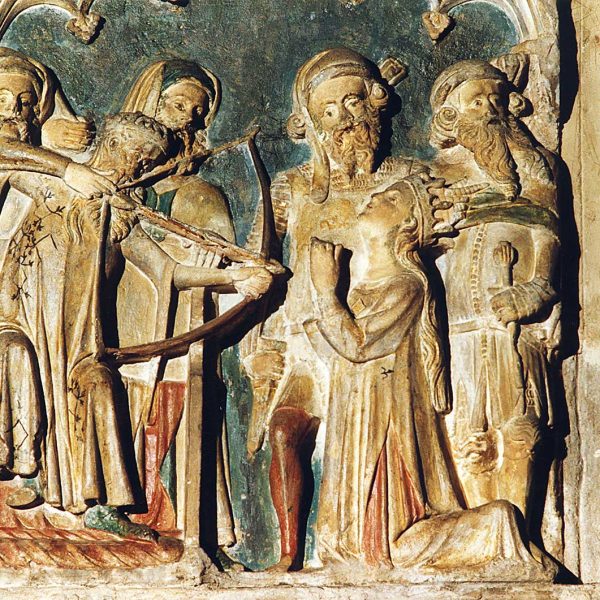 Lleida.- Església de Sant Llorenç, S. XII d'estils romànic i gòtic. Detall del retaule gòtic de pedra policromada de Santa Úrsula del S. XIV de Jaume Cascalls (5/2000)