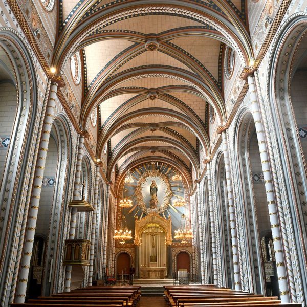 La Seu d’Urgell.- Capella neoromànica del Seminari Conciliar d’una nau coberta amb voltes de llunetes sostingudes per semi columnes adossades als contraforts (4/2022)